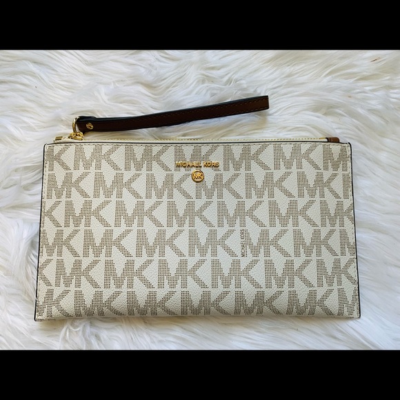 Michael Kors Handbags - New MK Michael Kors jet set large wristlet